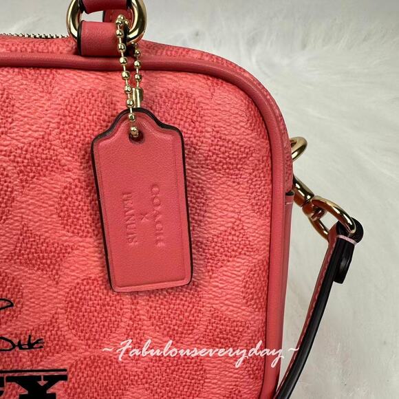 Coach X Peanuts Satchel Crossbody Bag In Sig Canvas with Lucy In Coral CBJ62 NWT - Picture 9 of 10